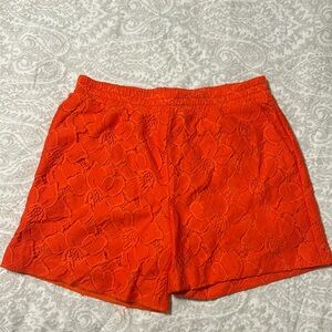 Orange lace shorts